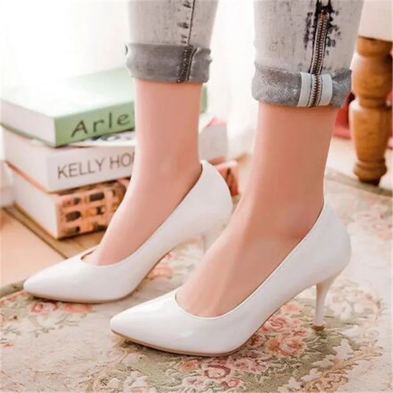 PUMPS HEELED SHOES