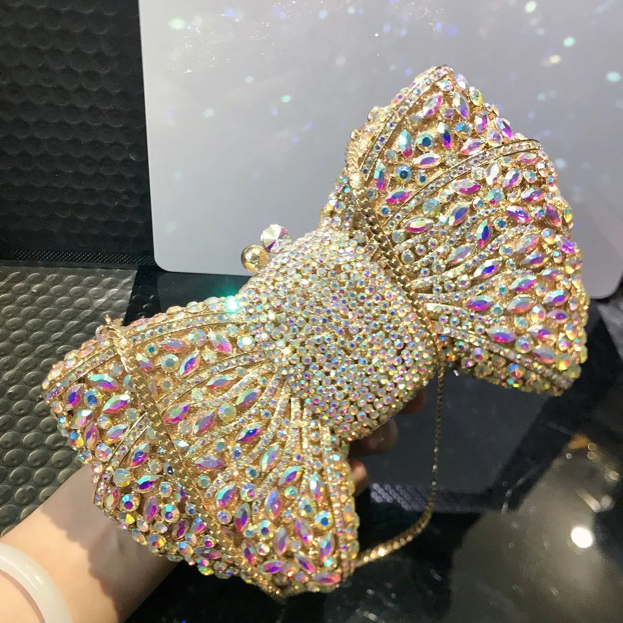 BOW STONE CLUTCH BAG